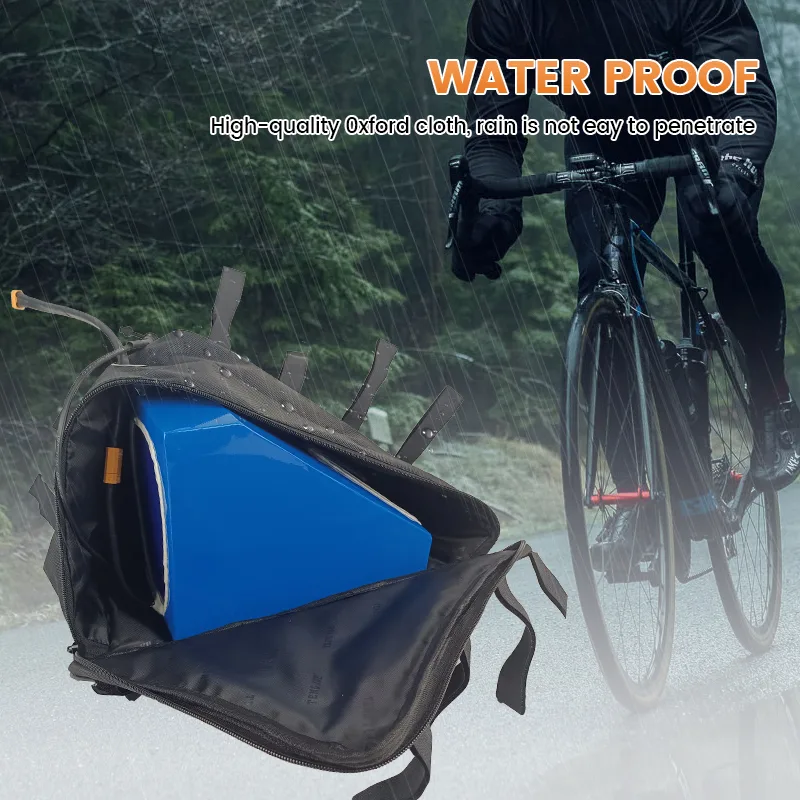 Cyclist in rain with waterproof bag.